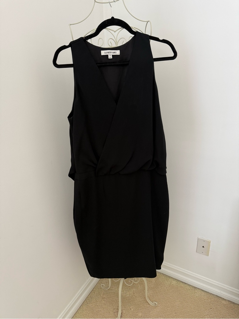 Elizabeth and James Black Sleeveless Surplice Mini Dress